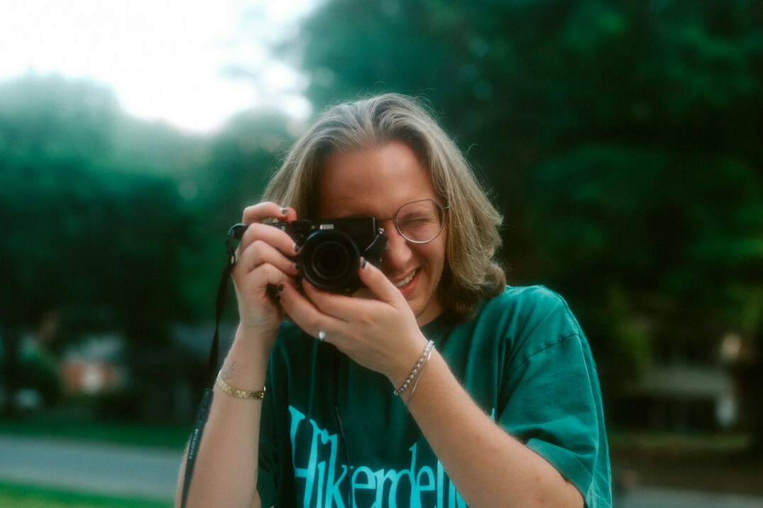Portrait of a female photojournalist smiling