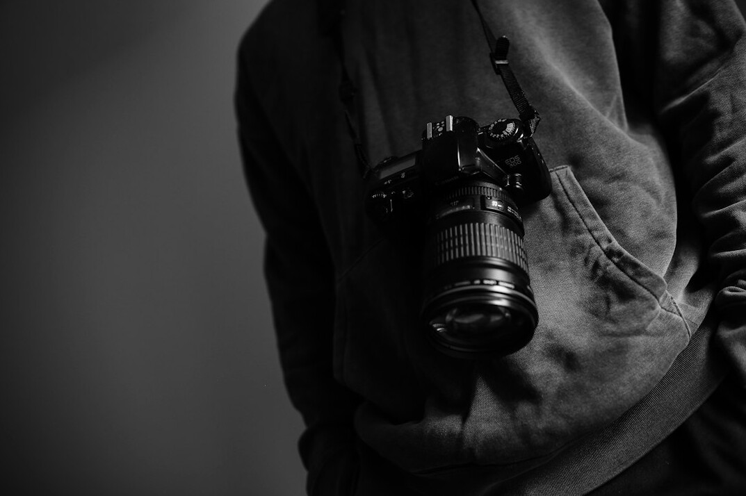 documentary photographer with camera