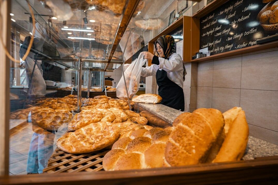 baker serving bread